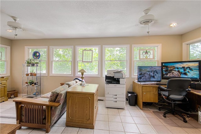 13605 W 48th St, Shawnee, KS 66216 - office featuring light tile patterned floors, ceiling fan, and radiator heating unit
