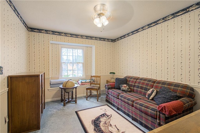 13605 W 48th St, Shawnee, KS 66216 - living room featuring a ceiling fan, wallpapered walls, carpet flooring, and baseboards