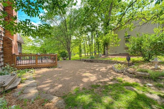 13605 W 48th St, Shawnee, KS 66216 - view of yard with a wooden deck