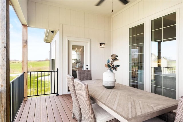 8016 Round Prairie St, Shawnee, KS 66220 - sunroom / solarium with plenty of natural light, a ceiling fan, and outdoor dining area