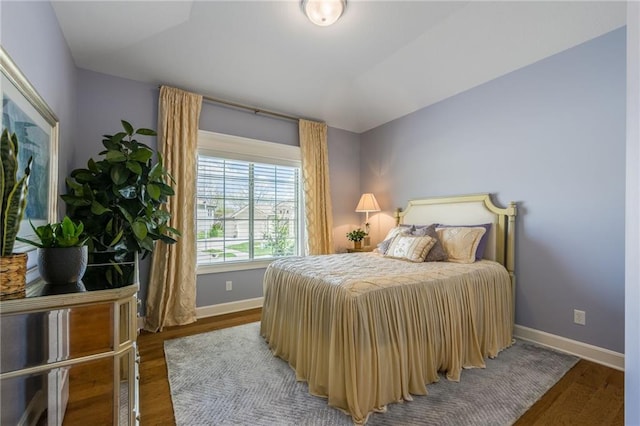 420 NW Kaylea Ct, Lees Summit, MO 64081 - bedroom featuring wood finished floors and baseboards