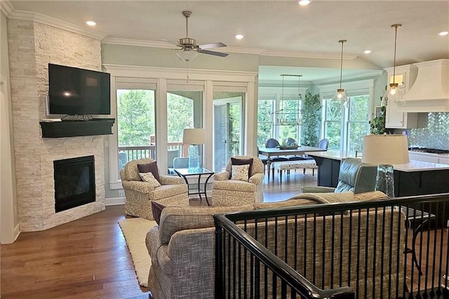 420 NW Kaylea Ct, Lees Summit, MO 64081 - living room with healthy amount of natural light, ceiling fan, a stone fireplace, wood finished floors, and recessed lighting