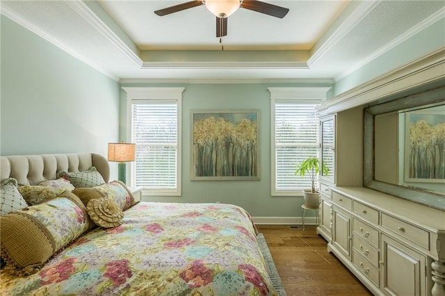 420 NW Kaylea Ct, Lees Summit, MO 64081 - bedroom featuring a tray ceiling, wood finished floors, ceiling fan, and crown molding