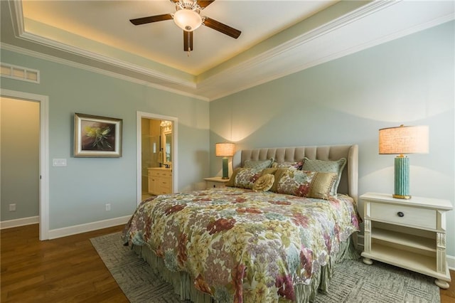 420 NW Kaylea Ct, Lees Summit, MO 64081 - bedroom with a raised ceiling, wood finished floors, ornamental molding, ensuite bath, and a ceiling fan