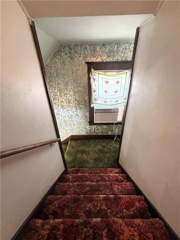 214 W 5th St, Lebo, KS 66856 - staircase with carpet floors, cooling unit, and lofted ceiling
