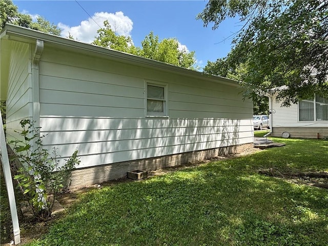 214 W 5th St, Lebo, KS 66856 - view of side of property featuring a yard