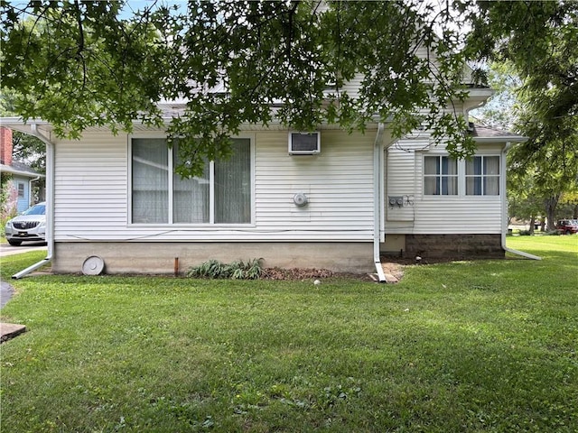 214 W 5th St, Lebo, KS 66856 - view of side of property with a lawn