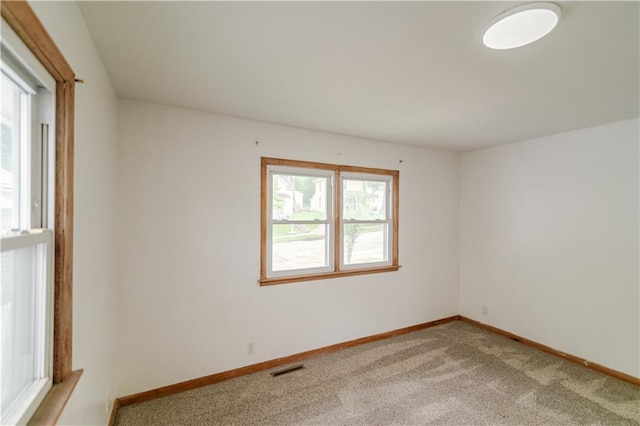 717 Y St, Atchison, KS 66002 - unfurnished room featuring light colored carpet and baseboards