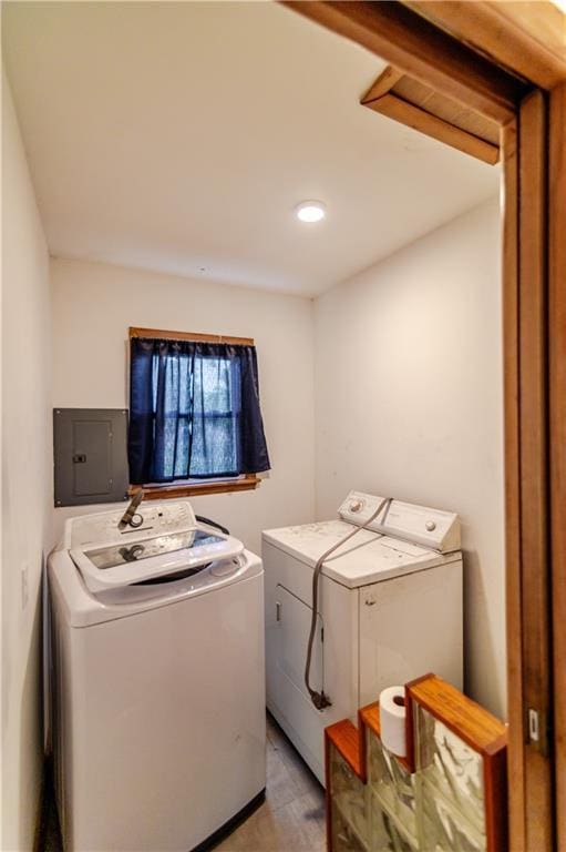 717 Y St, Atchison, KS 66002 - laundry room featuring electric panel, independent washer and dryer, and recessed lighting