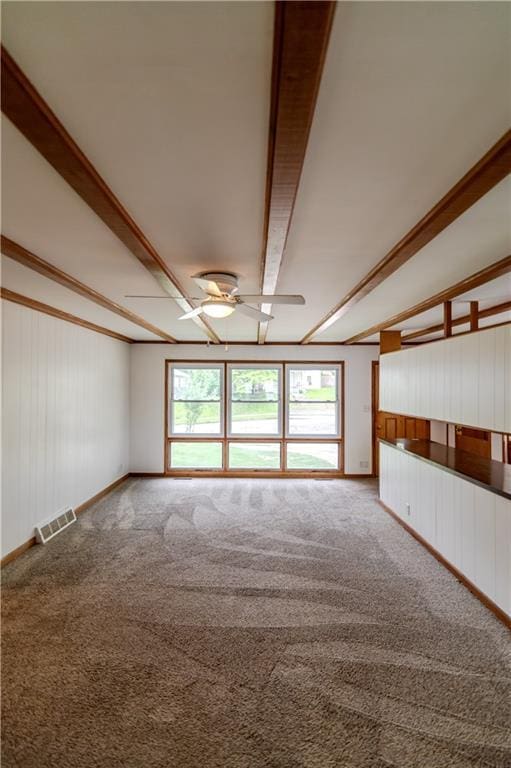 717 Y St, Atchison, KS 66002 - unfurnished room featuring carpet flooring, a ceiling fan, and baseboards