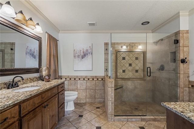 9015 Craig Dr, De Soto, KS 66018 - bathroom featuring vanity, ornamental molding, a stall shower, tile walls, and toilet