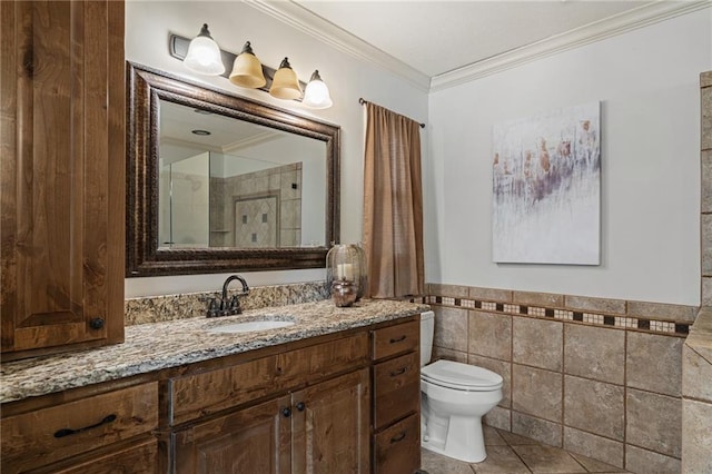 9015 Craig Dr, De Soto, KS 66018 - bathroom featuring toilet, vanity, tile walls, ornamental molding, and tile patterned flooring