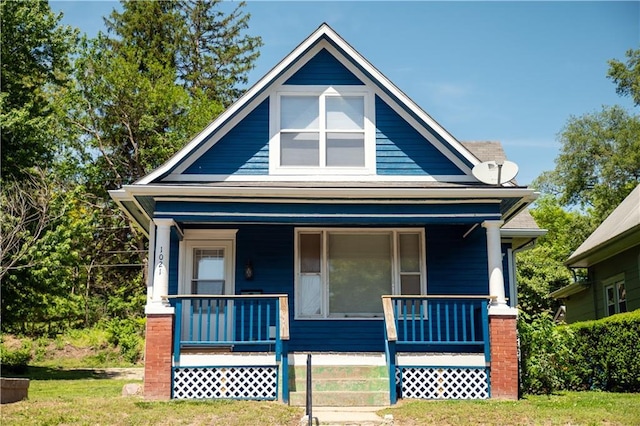 view of front of home featuring covered porch