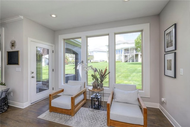 sitting room featuring wood finished floors, baseboards, and recessed lighting