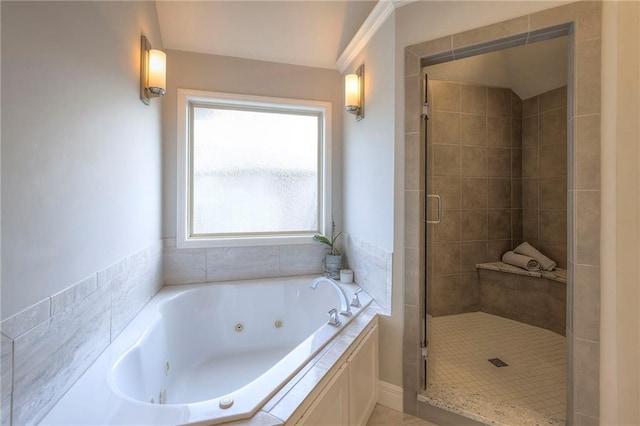 full bath featuring a tub with jets and a stall shower