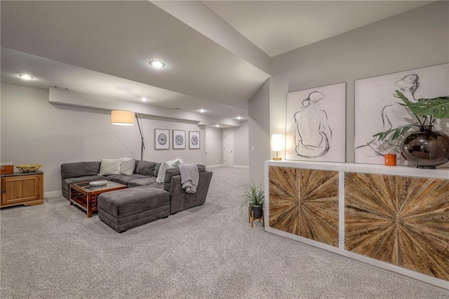 living area with recessed lighting, baseboards, and carpet floors