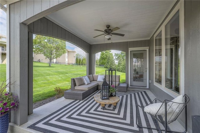 view of patio featuring outdoor lounge area and a ceiling fan