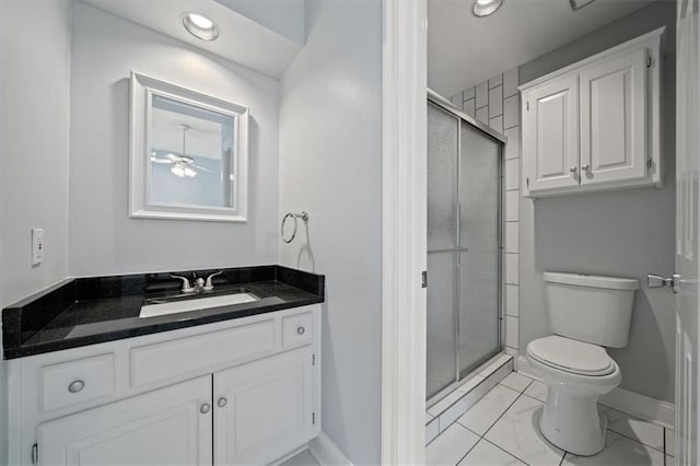 full bathroom featuring vanity, toilet, recessed lighting, baseboards, and a shower stall