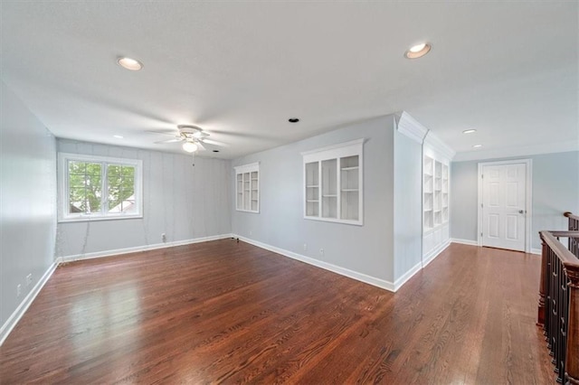 empty room with a ceiling fan, baseboards, recessed lighting, and dark wood-style floors