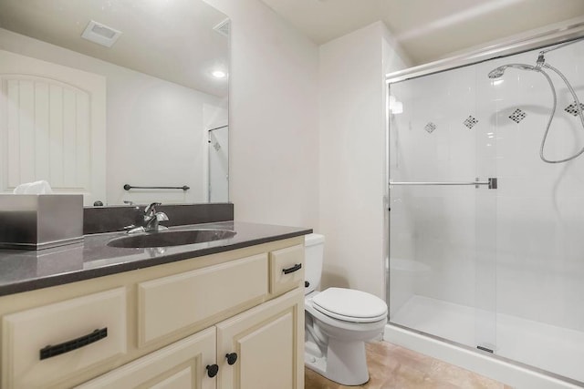 21287 W 116th St, Olathe, KS 66061 - bathroom with a shower stall, toilet, vanity, and tile patterned floors