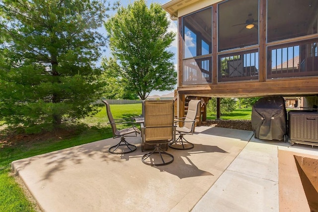 21287 W 116th St, Olathe, KS 66061 - view of patio featuring a sunroom and outdoor dining space