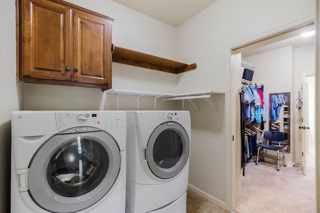 21287 W 116th St, Olathe, KS 66061 - washroom with cabinet space, washer and dryer, baseboards, and light colored carpet