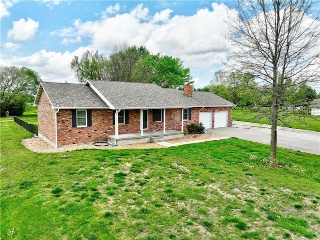 ranch-style house with a porch, a front lawn, brick siding, concrete driveway, and an attached garage