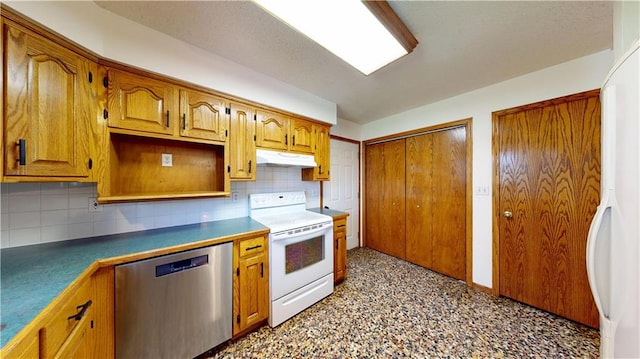 kitchen featuring dark countertops, tasteful backsplash, under cabinet range hood, and white appliances
