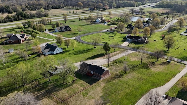 birds eye view of property featuring a rural view