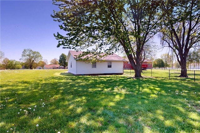 view of yard with fence