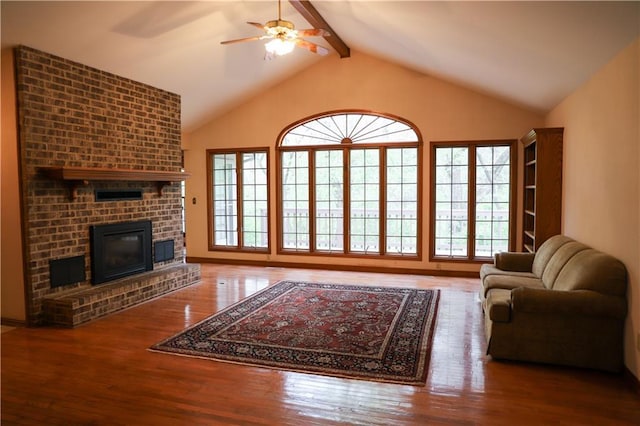 1203 E Quincy St, Pittsburg, KS 66762 - living area featuring wood finished floors and a wealth of natural light