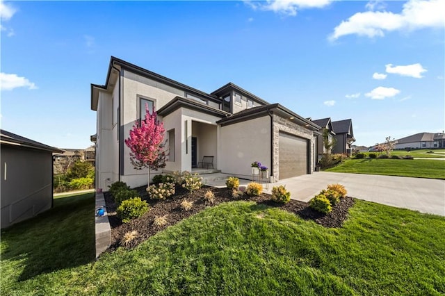 contemporary house with an attached garage, stucco siding, a front yard, and concrete driveway