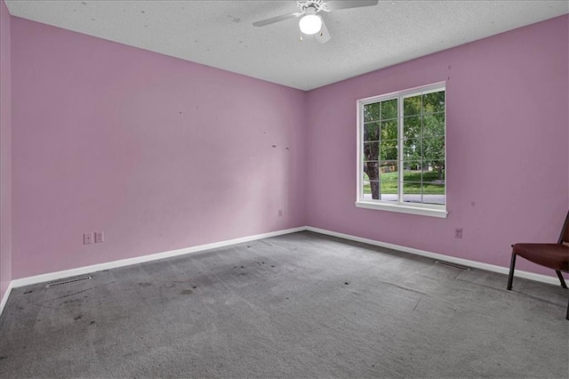 120 NW Whitlock Dr, Lees Summit, MO 64081 - spare room with carpet floors, a ceiling fan, a textured ceiling, and baseboards