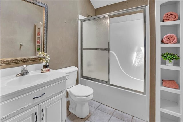 120 NW Whitlock Dr, Lees Summit, MO 64081 - full bath with tile patterned flooring, vanity, bath / shower combo with glass door, toilet, and built in features