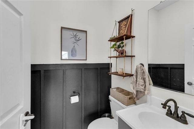 24101 S State Route K, Pleasant Hill, MO 64080 - half bath featuring toilet, wainscoting, and vanity