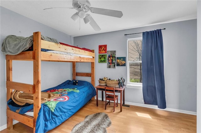 24101 S State Route K, Pleasant Hill, MO 64080 - bedroom with wood finished floors, baseboards, and ceiling fan