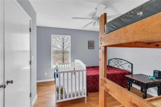 24101 S State Route K, Pleasant Hill, MO 64080 - bedroom featuring wood finished floors and baseboards