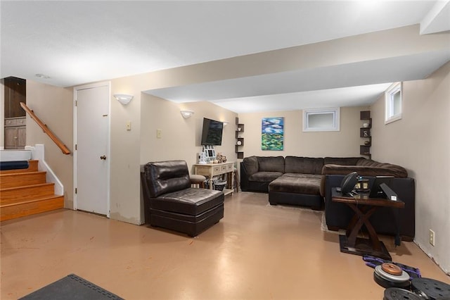 living room with stairway and concrete floors