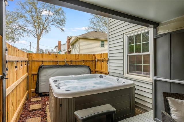 6806 N Euclid Ave, Kansas City, MO 64119 - wooden deck with fence and a hot tub