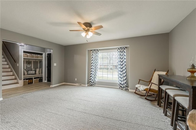 6806 N Euclid Ave, Kansas City, MO 64119 - unfurnished room featuring stairway, baseboards, carpet, and a ceiling fan