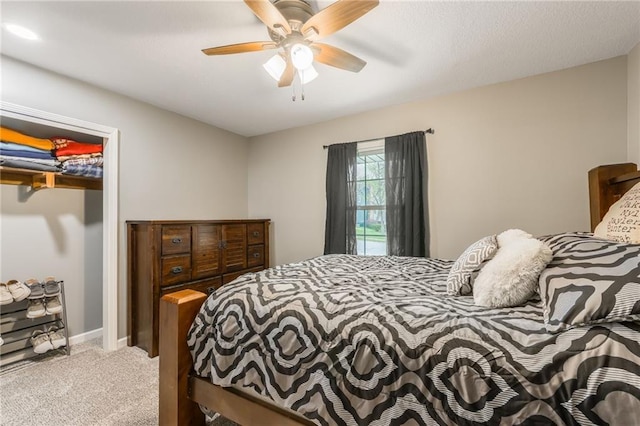 6806 N Euclid Ave, Kansas City, MO 64119 - bedroom with baseboards, carpet, and ceiling fan