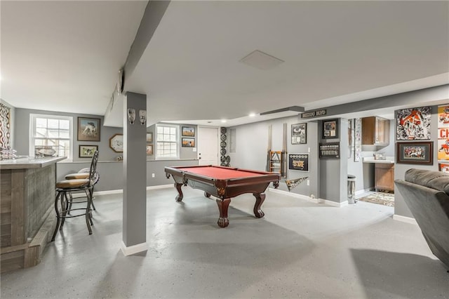 6806 N Euclid Ave, Kansas City, MO 64119 - game room with a bar, pool table, baseboards, and a wealth of natural light