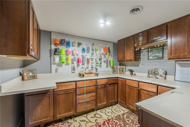6806 N Euclid Ave, Kansas City, MO 64119 - kitchen featuring light countertops and visible vents