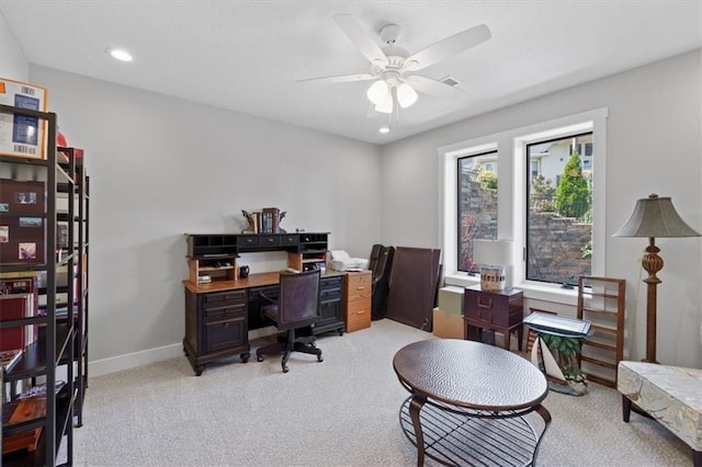home office featuring light colored carpet, a ceiling fan, baseboards, and recessed lighting