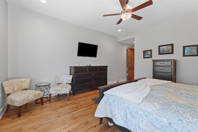 bedroom with light wood-style floors, recessed lighting, baseboards, and ceiling fan