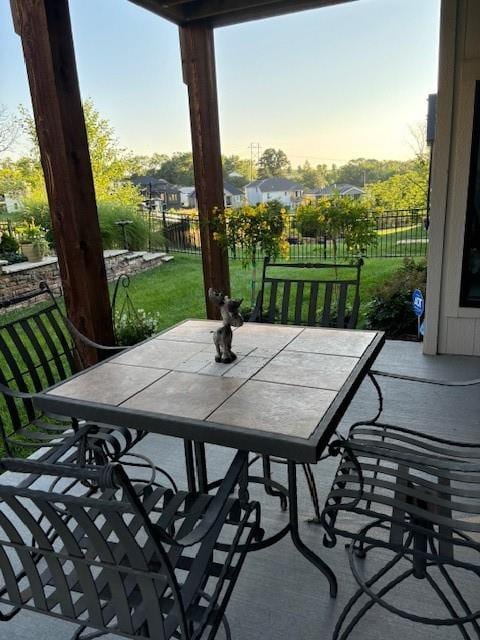 patio terrace at dusk with outdoor dining space