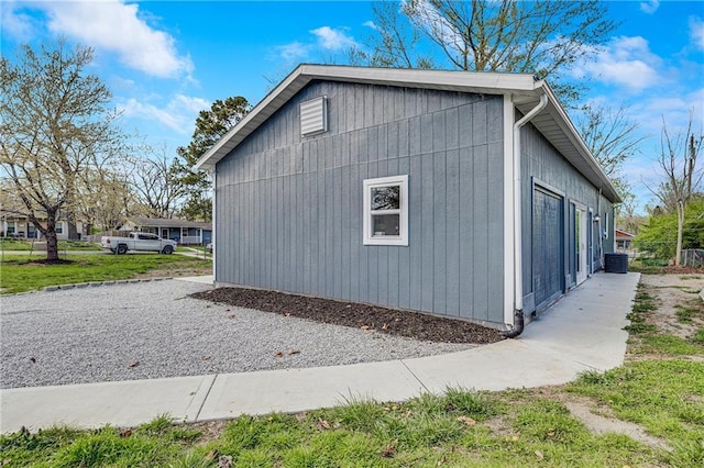 view of property exterior with central AC