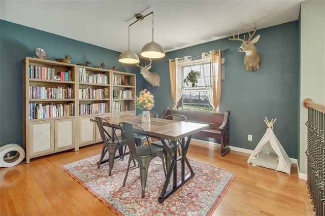 dining area with light wood finished floors