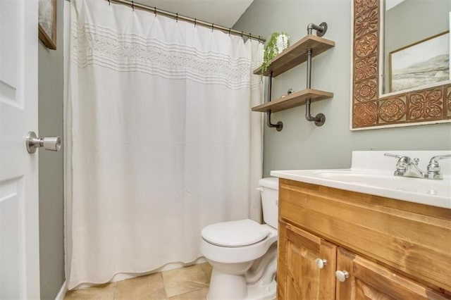 full bath featuring toilet, tile patterned floors, vanity, and curtained shower
