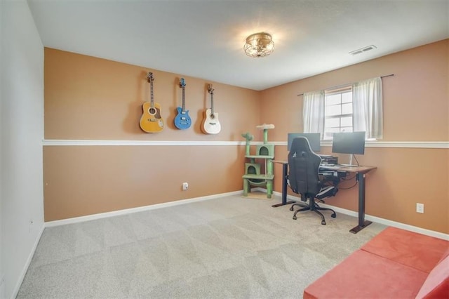 carpeted office space featuring baseboards and visible vents